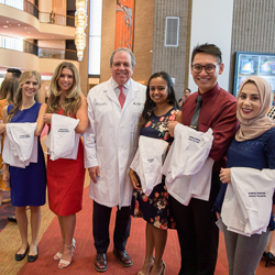 Class of 2023 Students Pose with Dr. Michael Dake