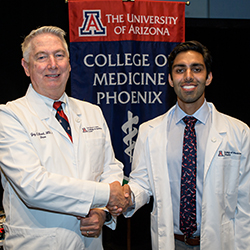 First-year student Arjun Johal with Dean Reed