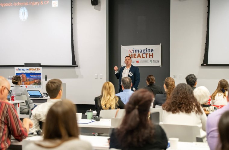 Michael Kruer, MD, Speaks at the 2019 reimagine Health Research Symposium