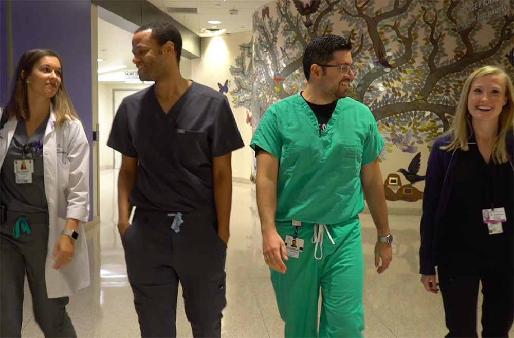 Four Residents Walk through Banner - University Medical Center Phoenix