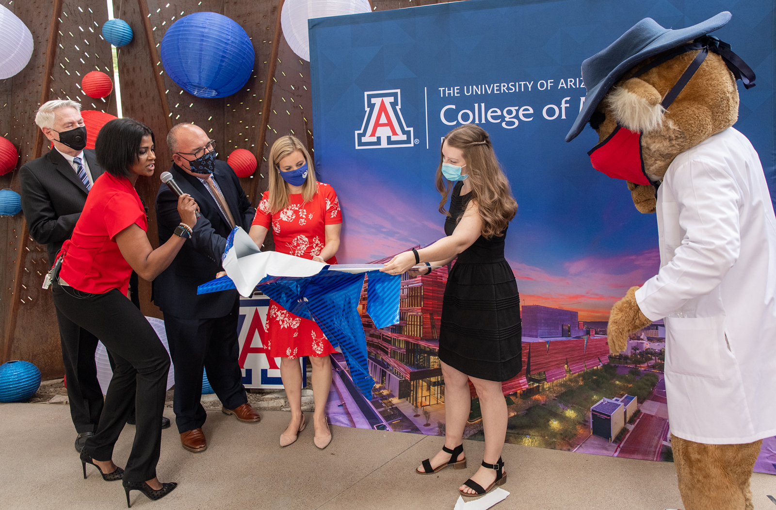 Mary Beth Putz Unwraps Her Scholarship Check from the AZ Lottery