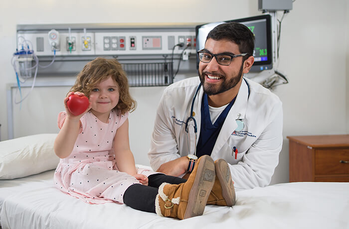 A Medical Student with a Pediatric Patient in the Sim Center