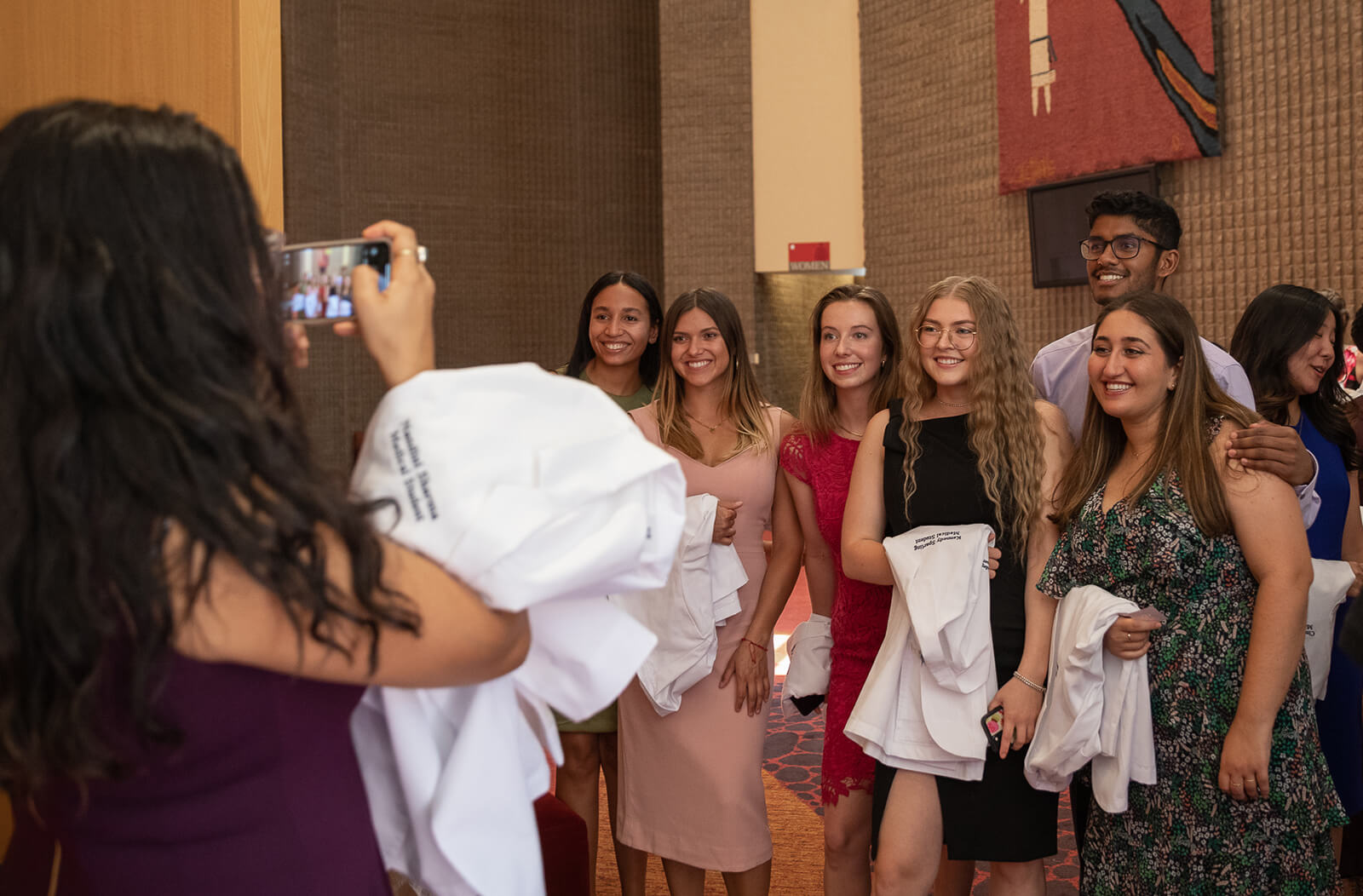 Members of the Class of 2026 pose for a photo at their White Coat Ceremony