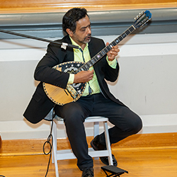 Ayman Fanous, MD, performed a couple of guitar arrangements for the event