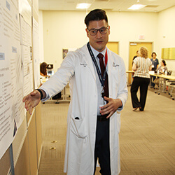A Resident Presents His Research during Harlan Stone Scholarship Day