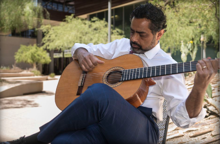 Ayman Fanous is playing Guitar 