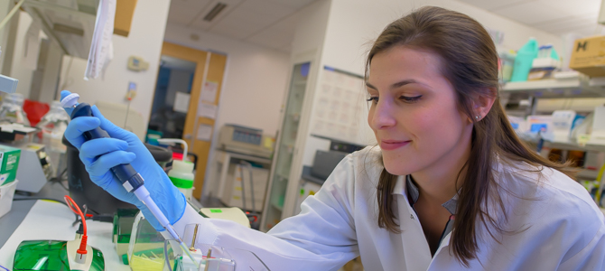Alexandra Garvin, PhD, a postdoctoral fellow, conducting research experments