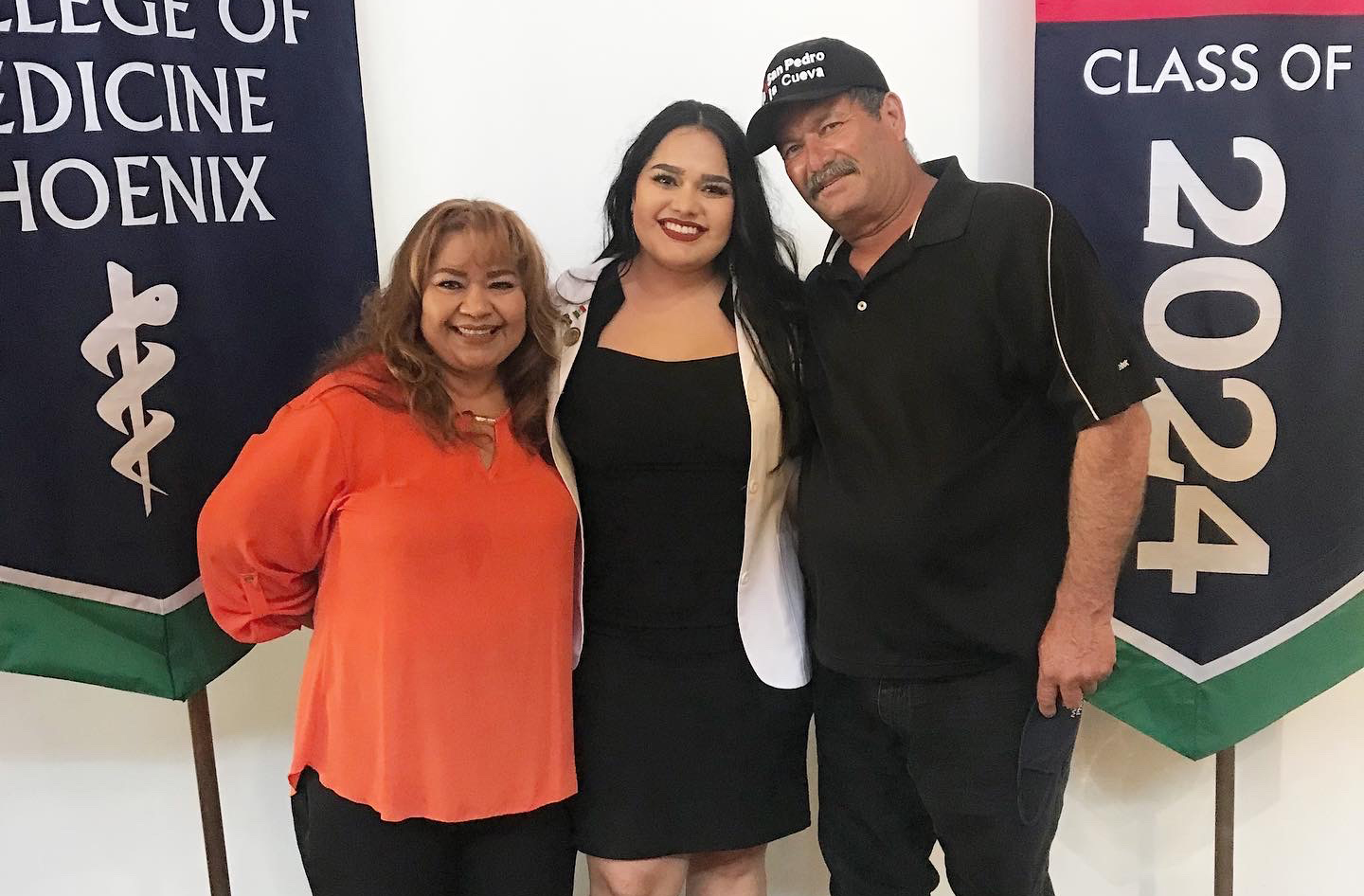 Jovanna Figueroa with her parents at the Class of 2024 White Coat Ceremony