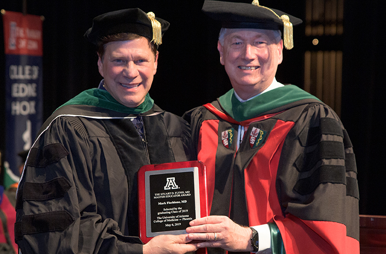 Dr. Mark Fischione with Dean Guy Reed, MD, MS, at the Class of 2019 Commencement