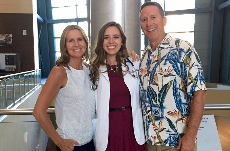 Cayman Martin with Her Parents at Her White Coat Ceremony