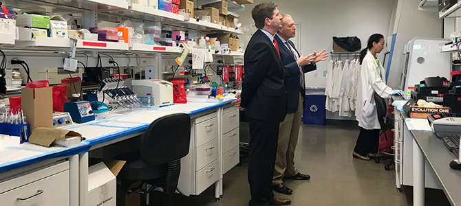 Dr. Zenhausern Shows His Lab Space to Mayor Greg Stanton