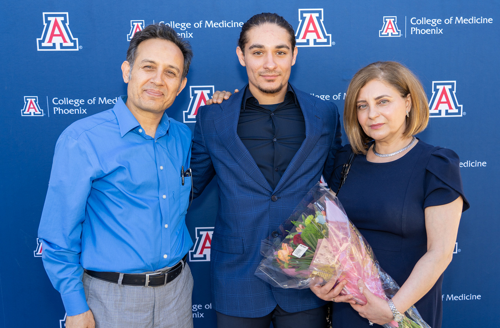 Alireza Moussavi with his parents at the Pathway Scholars celebration