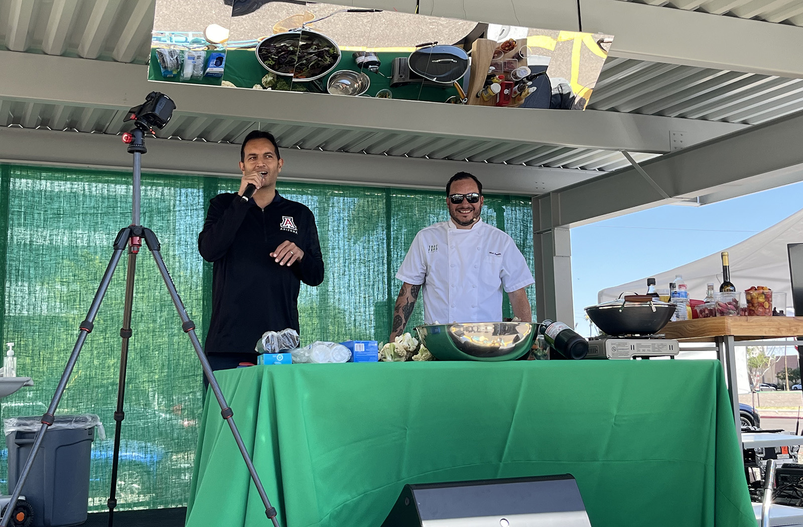 Shad Marvasti, MD, MPH, and Matthew Padilla, chef and VP of Culinary Innovation at True Food Kitchen, preparing their cooking demonstration