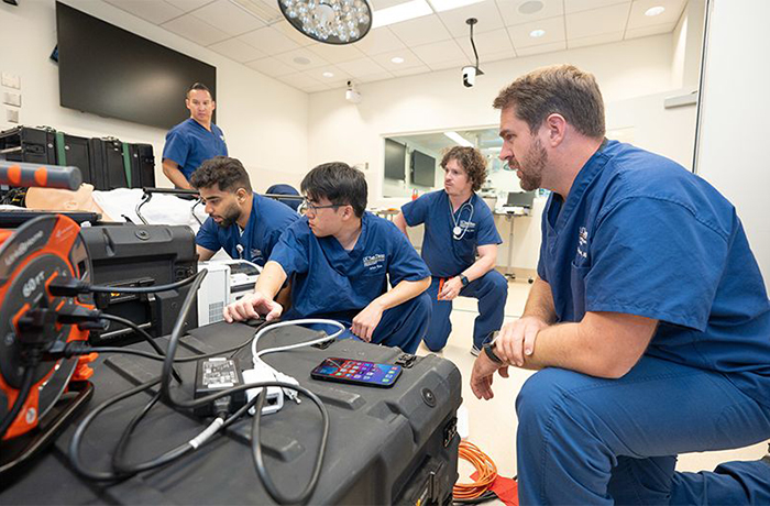 Drs. Jeffrey Tully and Christian Dameff (far right) — graduates of the college's Class of 2014 — co-direct the UC San Diego Center for Healthcare Cybersecurity. (photo courtesy of UCSD Center for Healthcare Cybersecurity)