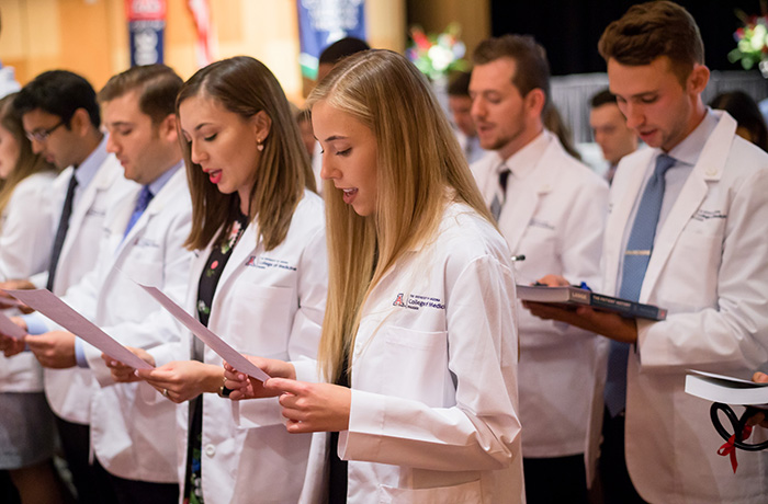 Students Reading Their Oath at the White Coat Ceremony