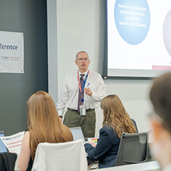 Dr. Fallon delivering his presentation