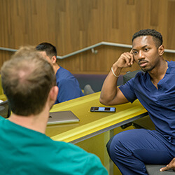 Split into groups, medical students were able to practice their medical Spanish together