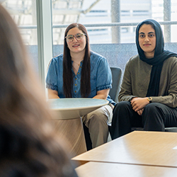 Jado (left) and other students in the program recently met with Dr. Zapien-Hidalgo on the college's campus