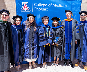 Provost Prelock with the PhD graduates and their faculty mentors.