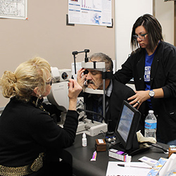 Dr. Mandi Conway treats patient. Photo courtesy of St. Vincent de Paul.