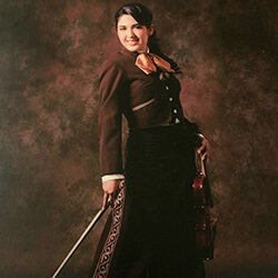 López De Gallegos in Traditional Mariachi Regalia