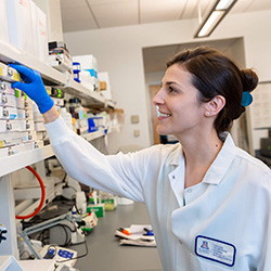 Dr. Garvin at work in the lab of Dr. Hale