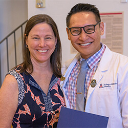 Dr. Susan Kaib, MD, a GHHS advisor, and Abel De Castro pose for a photo together