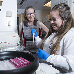 Dr. Hale works with research technician Dana Floyd in the Hale Lab at the College of Medicine – Phoenix