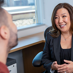 Dr. Lee-Iannotti consults with a patient