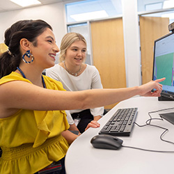 Dr. Jimenez utilizes computers to analyze the data they collect in the lab