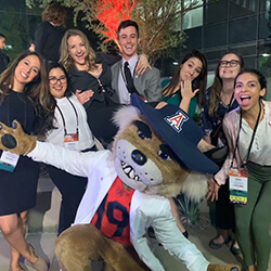 Maykowski and Fellow Medical Students Pose with Wilbur Wildcat