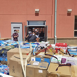 The Truckload of Supplies Being Dropped Off