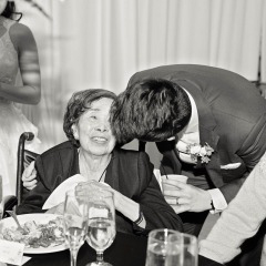 Nguyen shares a special moment with his grandmother at his wedding in 2022