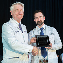 Dean Guy Reed, MD, MS, with Alumni Speaker David Reeder, MD