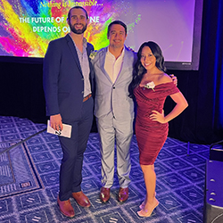 Marcus Childs and Abigail Solorio with Francisco Lucio, JD, associate dean of Equity Diversity and Inclusion, at the Scholars Summit