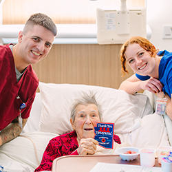 Avery and LeFiles presenting one of the veterans with their patch.