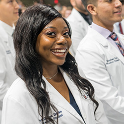 First-year medical student Millicent Darko at the Class of 2027 White Coat Ceremony