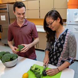 College of Medicine – Phoenix medical students participating in a cooking demonstration at the Wesley Community and Health Center