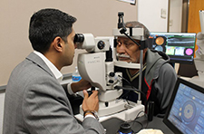 A Physician Performs an Eye Exam