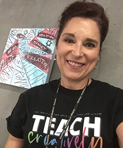 Cynthia Standley, PhD, in front of a Painting by Second-Year Medical Student Daniel Oheb