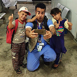 Dr. Behshad  with Refugee Children