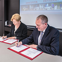 Dr. Zenhausern Signing the Agreement