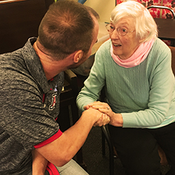 Tanner Heckle, MS3, Greets One of the Seniors