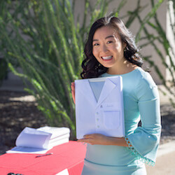 A Student Poses with Her Match