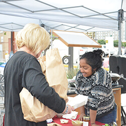 Bagchi speaking with attendee