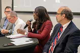 Panelists Timothy K. McDaniel PhD, Michael Fallon, MD, FACP, Titilayo Ilori, MD, MSCR, and Andreas Theodorou, MD, FCCM, FAAP, Discussing Large Research Cohorts for Real World Evidence