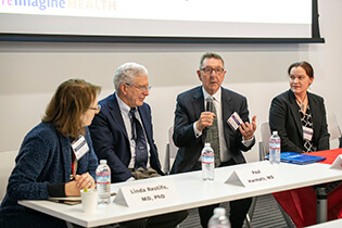 Panelists Linda Restifo, MD, PhD, Paul Harmatz, MD, Robert Roberts, MD, and Anastasia Wise, PhD discussing 'Is My Fate in My Genes?'