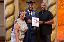 Trevon Brooks celebrates graduating from the PSP with his family at Convocation