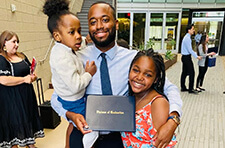 Patrick Quarles with is family at Pathway graduation