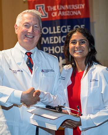 Tina Samsamshariat with Dean Reed at Her White Coat Ceremony
